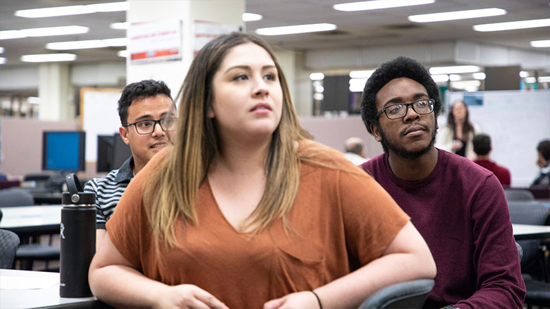 A group of students sitting attending a workshop
